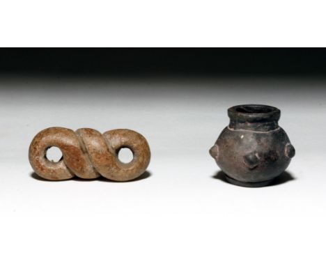 Pre-Columbian, Peru, Chimu for the pot, the snake is of unknown culture, ca. 900 to 1200 CE. A precious pairing of two cerami