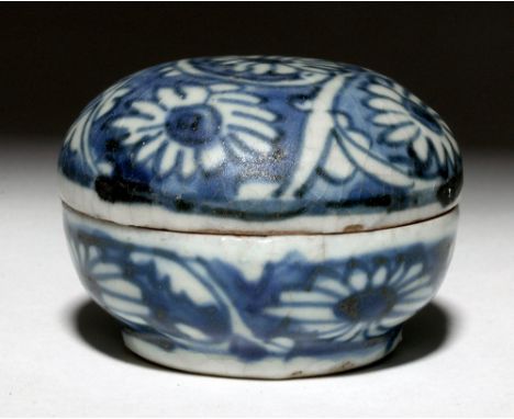China, Ming Dynasty, 1368 to 1644 CE. This is a ceramic jarlet with a rounded lid and blue and white designs of flowers. It w