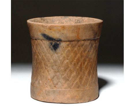 Pre-Columbian, Guatemala/Mexico, Postclassic Maya, ca. 1000 CE. This is a brown pottery cylinder with incised net designs aro