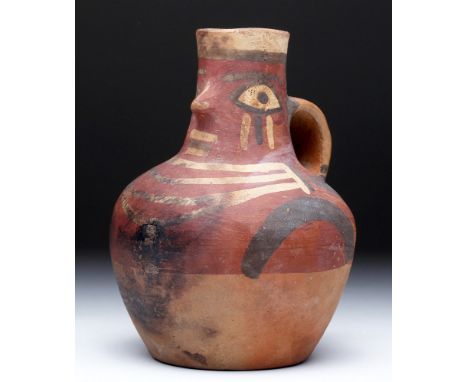 Pre-Columbian, Southern Peru, Huari/Wari, Middle Horizon period, ca. 650 to 1000 CE.  A figural jar with a strap handle and a