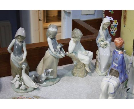 Four Lladro figures