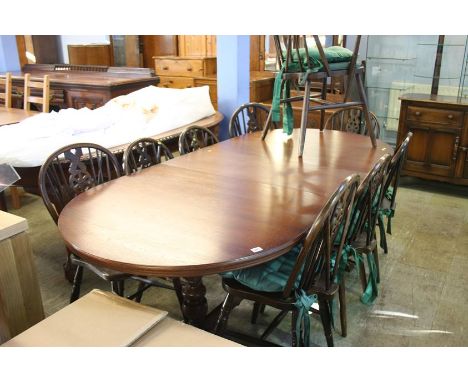 Ercol table and nine Windsor chairs 