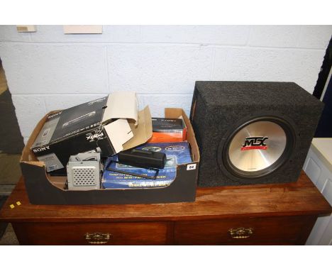 A box of audio equipment and accessories and "MTX Audio Thunder 5500" speaker