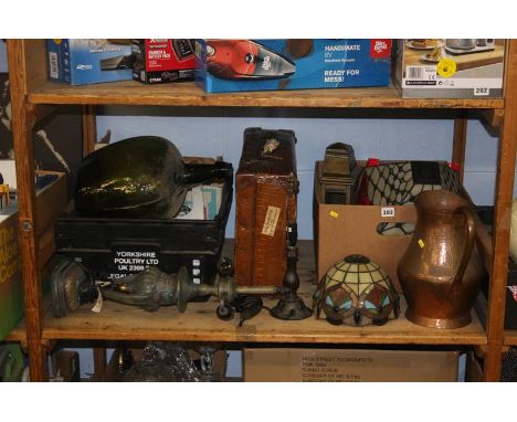 Shelf of assorted, mock croc suitcase etc.