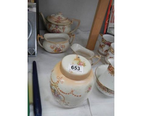 A three piece Ducal tea set and a biscuit barrel. COLLECT ONLY.