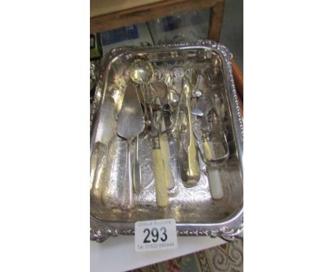 A silver plate dish, cutlery, ladle etc.,