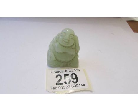 A jade Buddha.