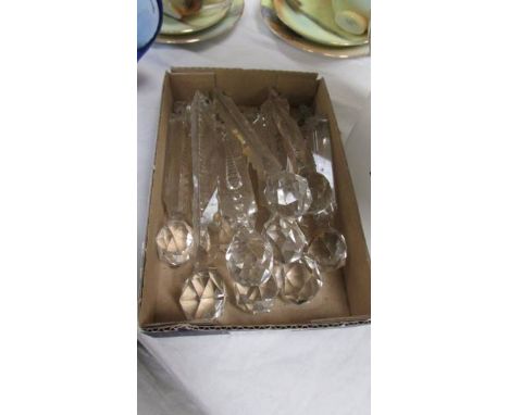 A quantity of cut glass chandelier droppers.