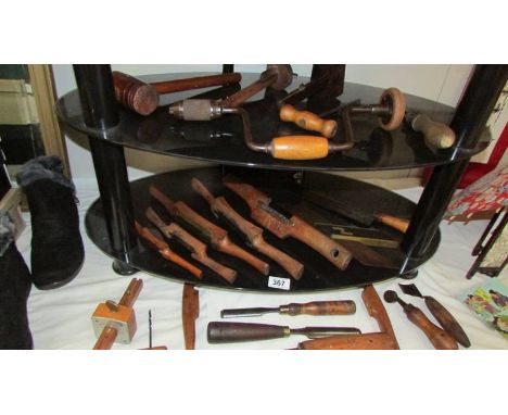 A good lot of vintage tools including drill, planes etc.,