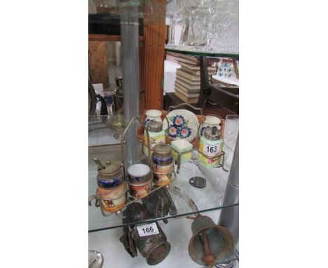 Three ceramic cruet sets.