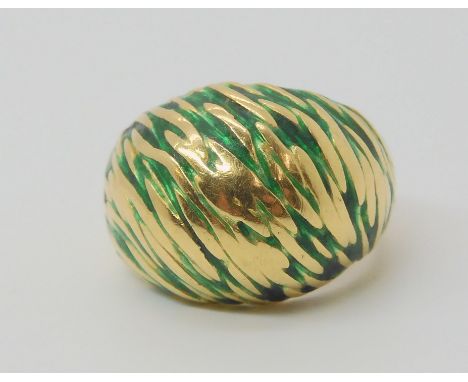 A KUTCHINSKY ENAMEL RING the 18ct yellow gold high domed ring is enamelled in green to the textured ground. Signed Kutchinsky