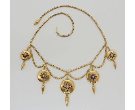 A VICTORIAN MOURNING NECKLACE with five button shaped pendants, with blue enamel stars, each set with a split pearl, strung t
