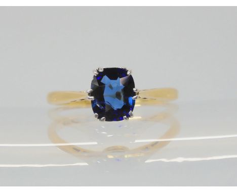 A SAPPHIRE RING with an 18ct and platinum, classic crown mount. Finger size L, weight 2.4gms Condition Report:Available upon 