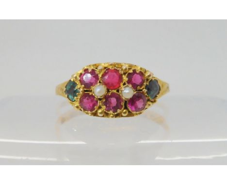 A VICTORIAN GEM SET RING hallmarked Birmingham 1876, set with pink and green gems and two pearls. With engraved shank and scr
