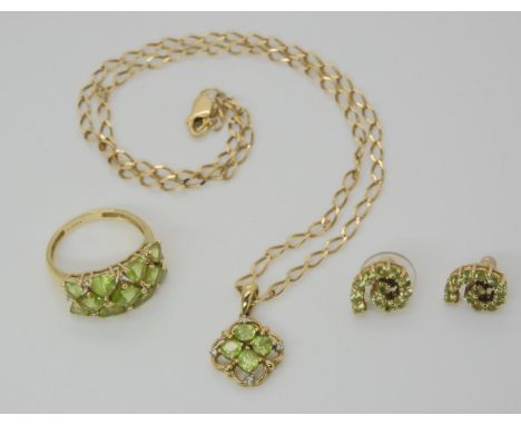 A COLLECTION OF PERIDOT JEWELS comprising of a 9ct gold flower pendant mounted with four peridots with four diamond accents t
