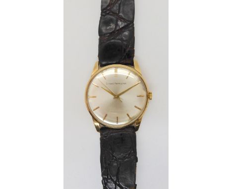 A 9CT GOLD GIRARD PEREGAUX WATCH with cream dial, gold baton numerals and hands. Diameter of the case 3.2cm, with a 19cm Hirs