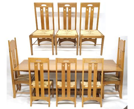 A 20TH CENTURY "MACKINTOSH CABINET MAKERS GLASGOW" OAK DINING TABLE AND SIX CHAIRS table with comb ends on stretchered base 7