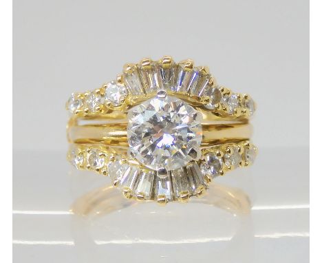 A 14K TWO PART DIAMOND DRESS RING comprising of a removable diamond solitaire of estimated approx 1ct, that fits inside a bag