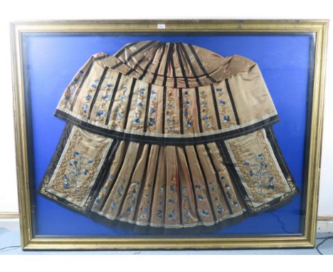 A CHINESE HAN STYLE PANEL SKIRT (MANG CHU)  Embroidered with a wish for prosperity with coins and peaches and floral emblems 