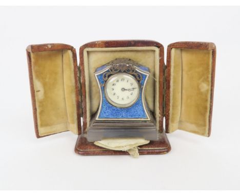 A FRENCH SILVER AND BLUE&nbsp;BASSE-TAILLE&nbsp;ENAMEL MINIATURE TIMEPIECE upon a carved agate base, with London import mark 