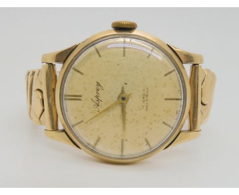 A 9CT GOLD ASPREY'S WRISTWATCH with cream dial signed Asprey, 17 jewels Shockproof. With gold coloured baton numerals and han