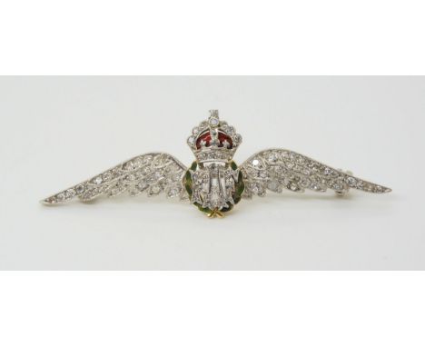 A DIAMOND RAF SWEETHEART BROOCH mounted in yellow and white metal set with eight cut diamonds and enamel. Length 6cm 1.8cm, w