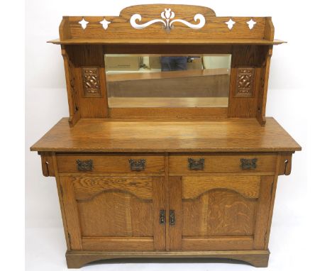 AN EARLY 20TH CENTURY OAK MAPLE &amp; CO ARTS AND CRAFT MIRROR BACK SIDEBOARD with pierced surmount and sides around rectangu