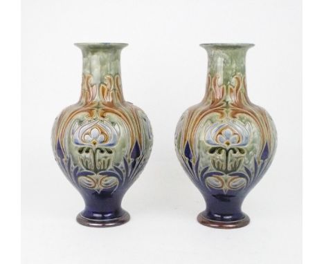 A PAIR OF ROYAL DOULTON VASES designed by Frank A Butler, of bulbous form with flaring neck decorated with stylised decoratio