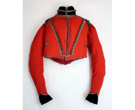 A RARE YEOMANRY CAVALRY TUNIC, CIRCA 1820 The scarlet wool body with black velvet facings to the high collar, cuffs and epaul