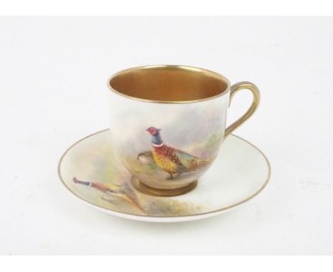 A ROYAL WORCESTER DEMITASSE CUP AND SAUCER each painted with pheasants and signed Maybury, date mark for 1952, cup 5cm high C