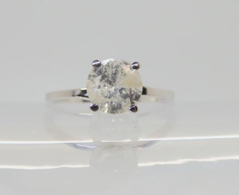 A DIAMOND SOLITAIRE RING set with an estimated approx 0.94ct brilliant cut diamond with a AGI certificate that states it is c