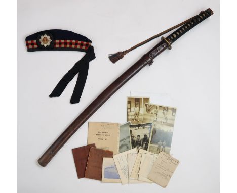 A JAPANESE SHOWA PERIOD SHIN GUNTO SWORD WITH WW2-ERA BRITISH ATTRIBUTION With machine made blade mounted with copper habaki,