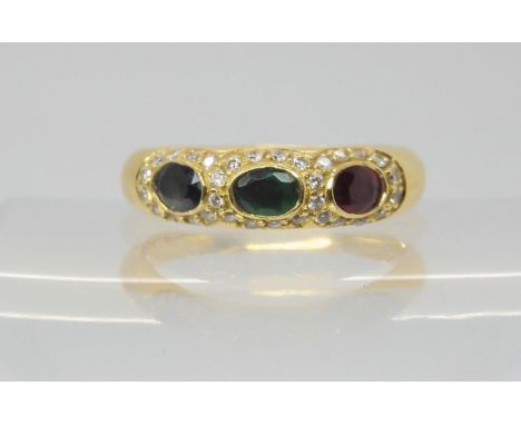 AN 18CT GOLD MIXED GEM RING set with sapphire, ruby and emerald with halos of diamonds, finger size S, weight 6gms. similar i