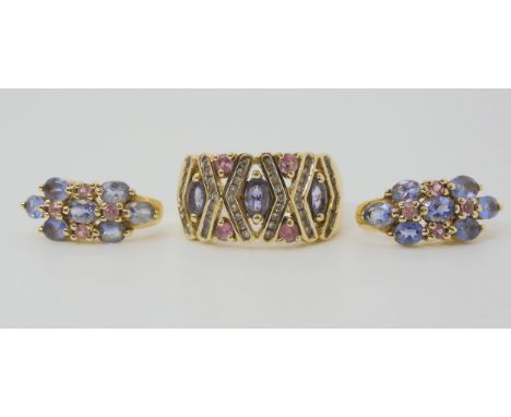 A 9CT TANZANITE &amp; PINK SAPPHIRE SUITE the ring set with oval tanzanites and pink sapphires with bands of channel set diam