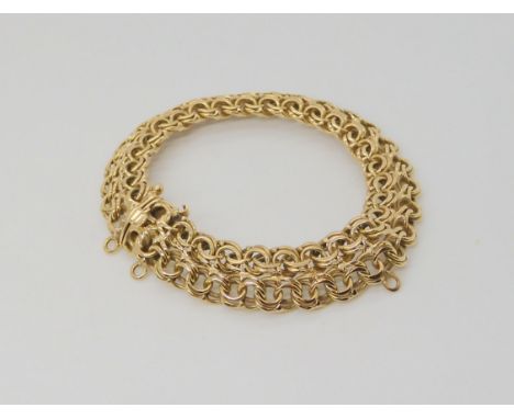 AN 18CT GOLD FANCY DOUBLE LINK BRACELET with box clasp, length 19.5cm, weight 31.8gms Condition Report:Q; Can you verify that