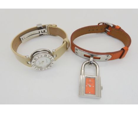 HERMES &amp; BULGARI WATCHES Hermes watch with orange leather strap, and stainless steel padlock style watch with orange dial