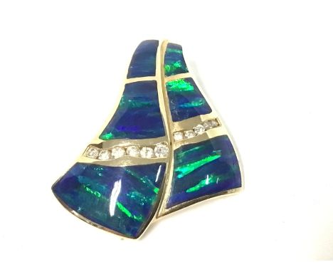 14ct gold brooch set with opal and diamonds. Total weight 9.15g Postage A