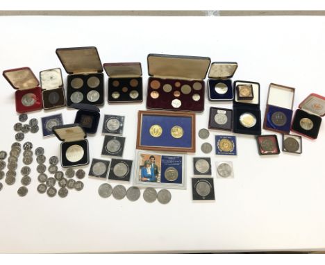 A collection of coinage and medals including the 2002 golden jubilee medal and first decimal coins. Postage B NO RESERVE