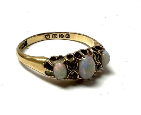 An Edwardian 18ct gold, opal and diamond ring, Size R.5. 3.8g, (A)