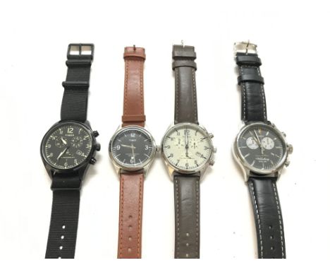 A collection of four Timex watches. First two seen running. Postage B.