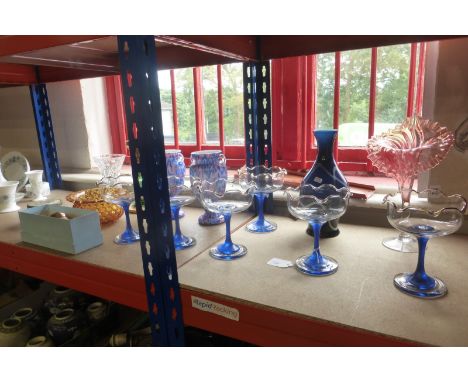 A set of six sundae glass bowls raised on blue stems and other glassware including Art vases.