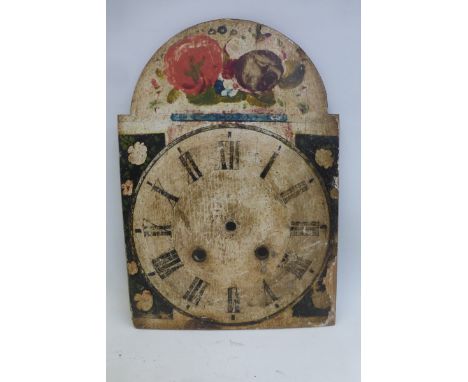 A 19th Century folk art polychrome painted pine clock dial.