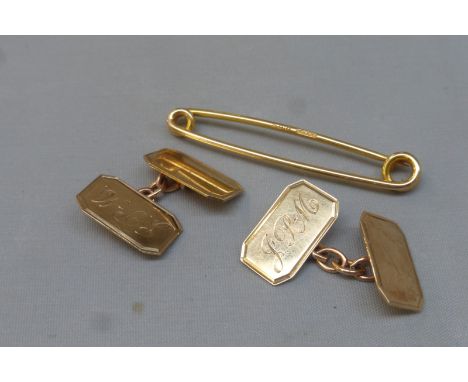 A pair of monogrammed 9ct gold cufflinks and a 9ct gold pin, approximate weight 7.1g.