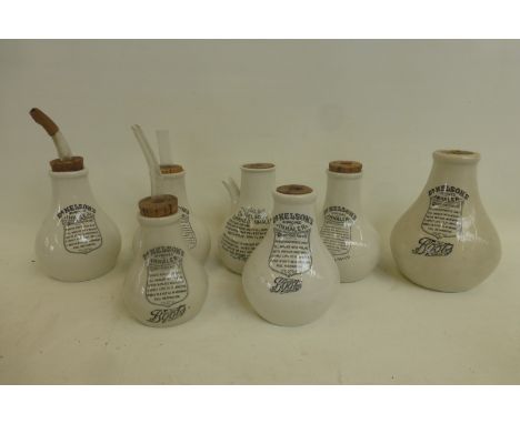 Seven ceramic Dr Nelson's improved inhalers, three inscribed "The Boots Chemist".