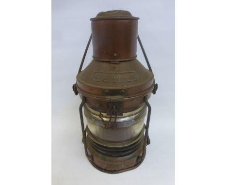 A 19th Century copper ship's port lantern with two inscribed plaques "Meteor" and "Not Under Command".