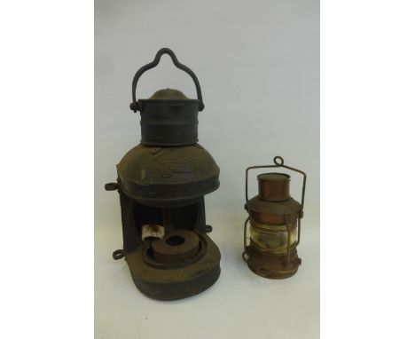 A ship's mast head lantern and a sea horse copper ship's lantern.