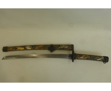 A Japanese Katana sword with all over decoration to the hilt and a scabbard depicting tigers.