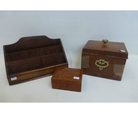 A tea caddy, a lidded box and an oak letter rack.