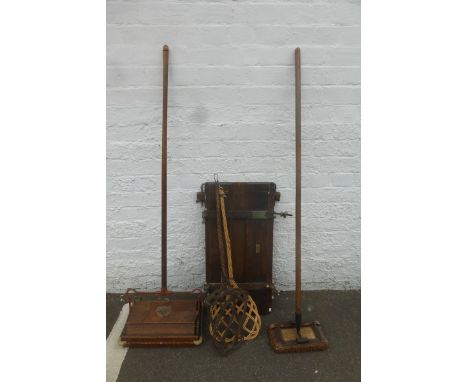 An oak Ewbank carpet sweeper, a floor buffer, a trouser press and two cane carpet beaters.