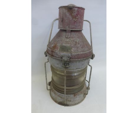 A large galvanised ship's port lantern with numbered plaque inscribed "Meteorite".